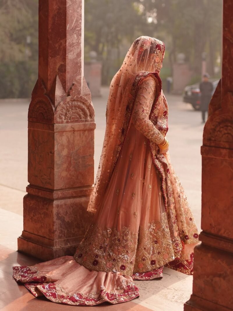 Bridal Lehenga in Soft Peach with Deep Red Embellished Borders - Image 2